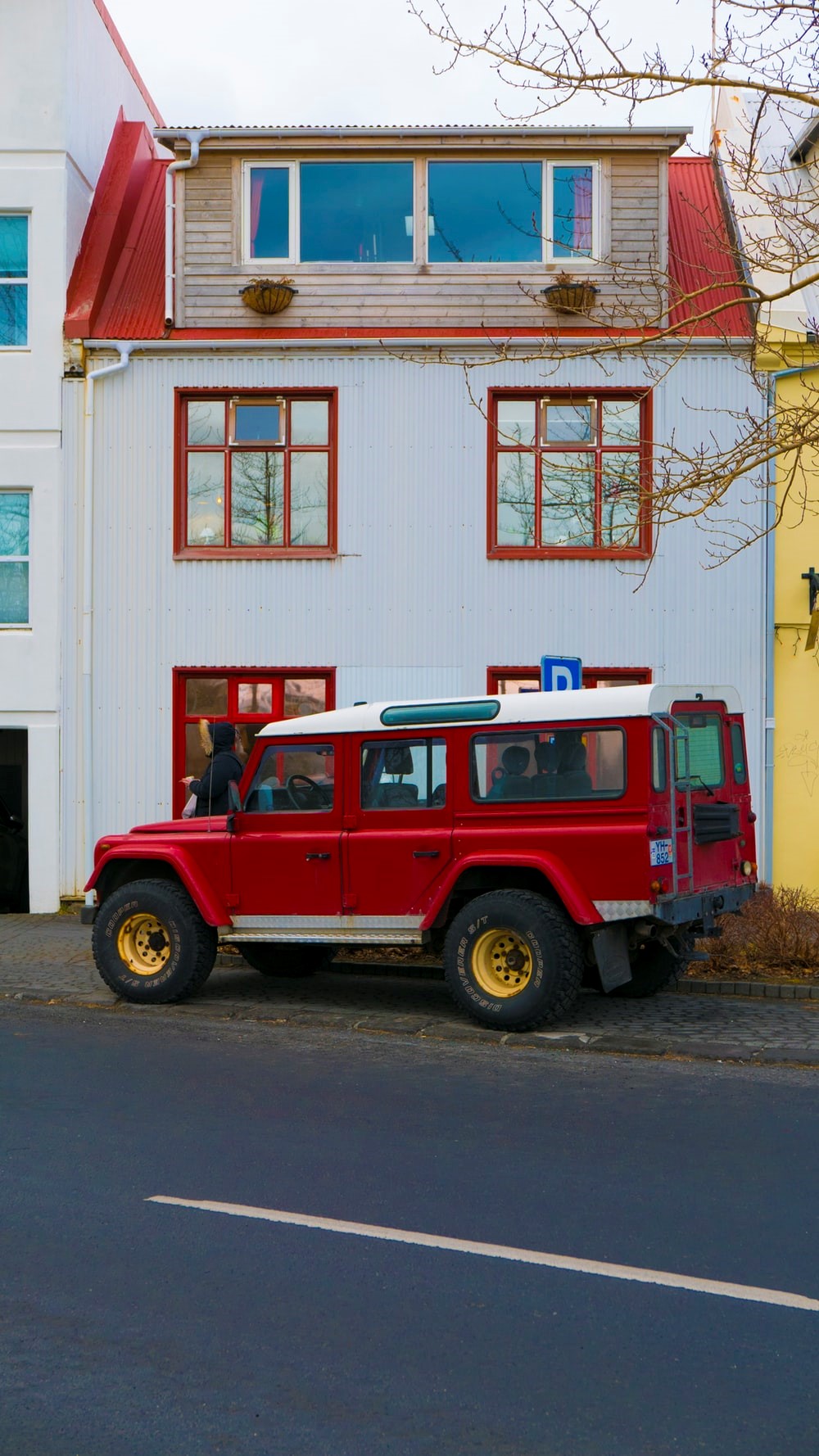Red House With Red Jeep